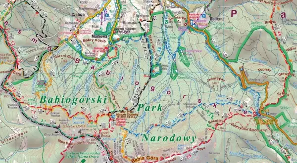 Mapa turystyczna **Beskidu Żywieckiego** z zaznaczonymi szlakami, szczytami (Babia Góra, Diablak) i obiektami.