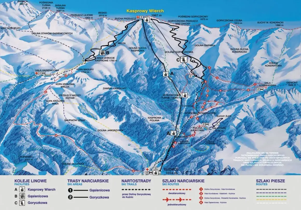 Mapa Tatr z zaznaczonymi szlakami narciarskimi i pieszymi, kolejkami linowymi i szczytami.